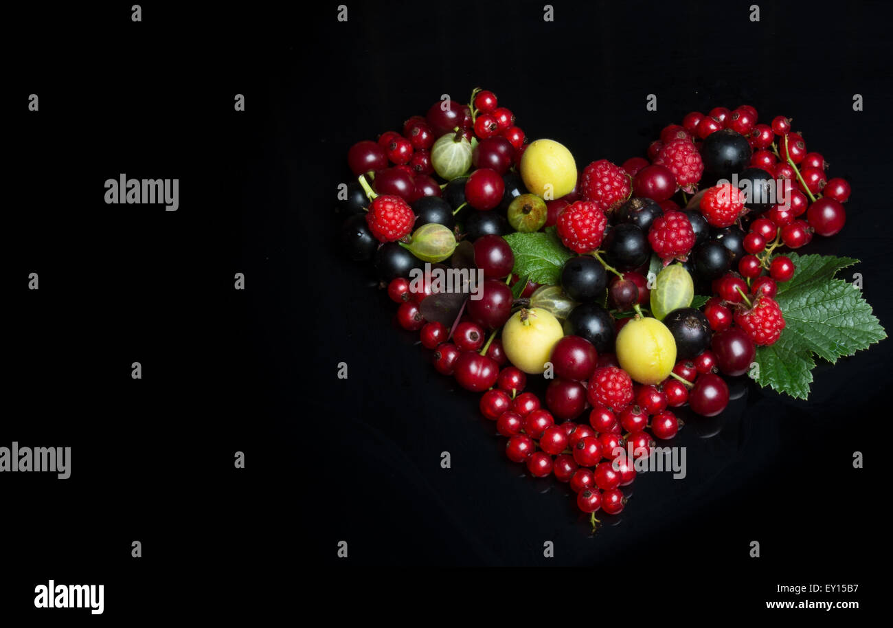 fruits in the form of a heart symbol of love Stock Photo - Alamy