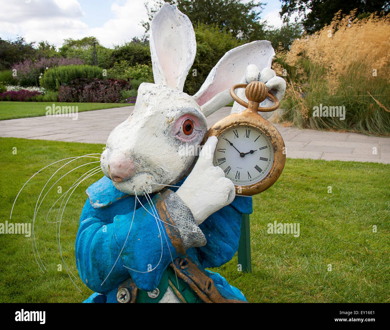 A sculpture of the White Rabbit in Alice in Wonderland. A sculpture by English Artist Alan Wallis at RHS Wisley Gardens, July 20 Stock Photo