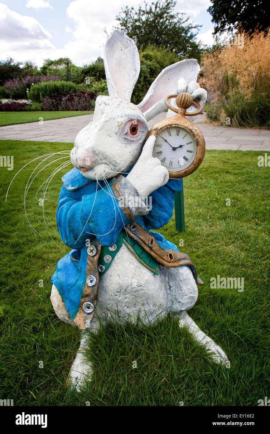 A sculpture of the White Rabbit in Alice in Wonderland. A sculpture by English Artist Alan Wallis at RHS Wisley Gardens, July 20 Stock Photo