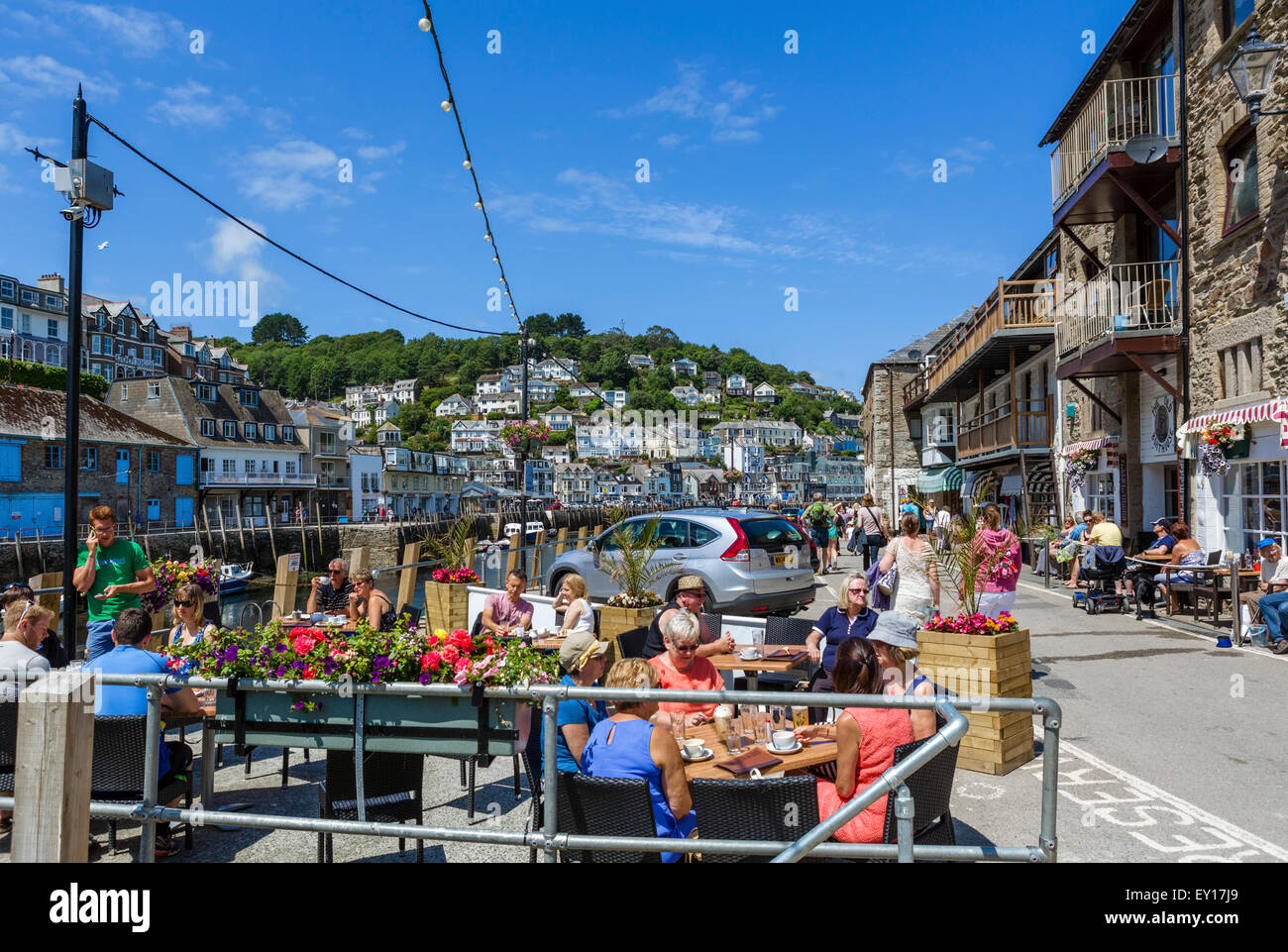 The Old Boathouse Pub on the Quay in East Looe looking over the river to West Looe, Cornwall, England, UK Stock Photo