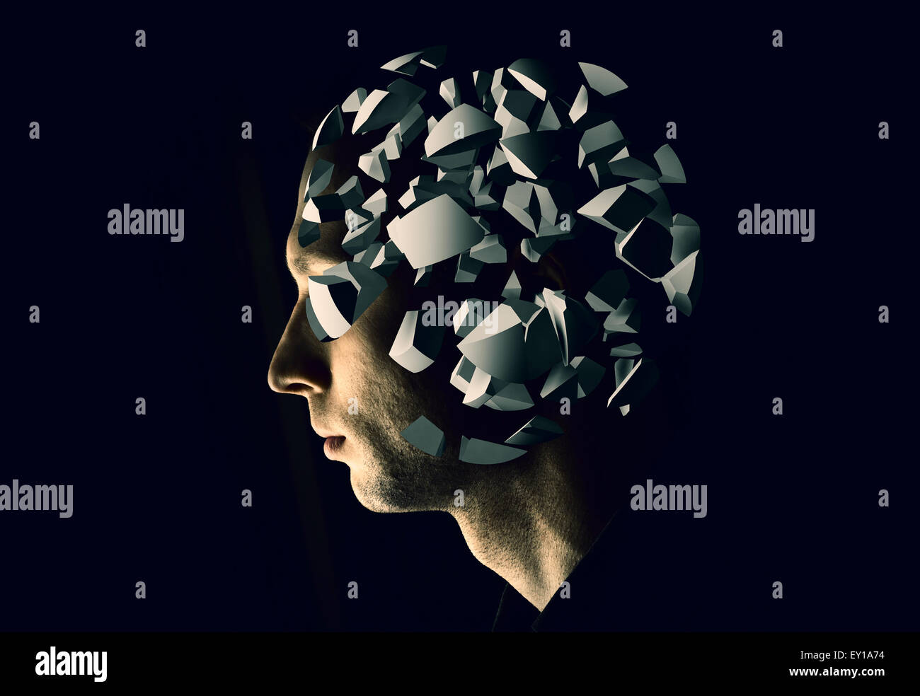 Cyborg profile portrait with brain explosion fragments on black background Stock Photo