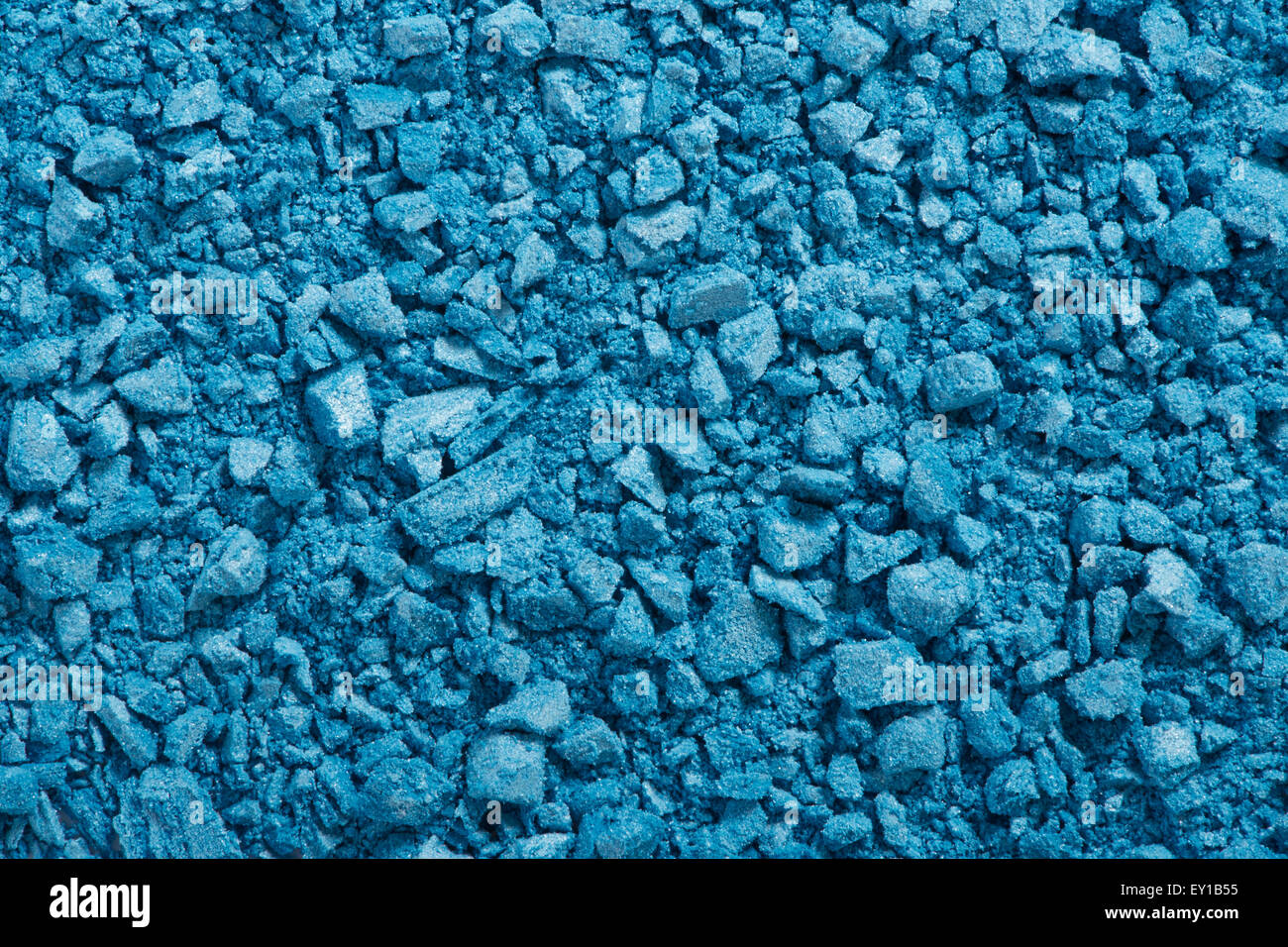 Blue eye shadow crushed, cosmetic texture background Stock Photo