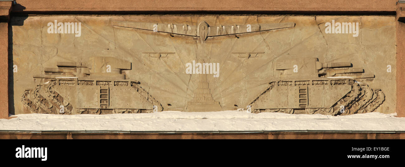 Soviet tanks and aircrafts and the Palace of the Soviets depicted on the Military Staff Building in Yekaterinburg, Russia. The B Stock Photo