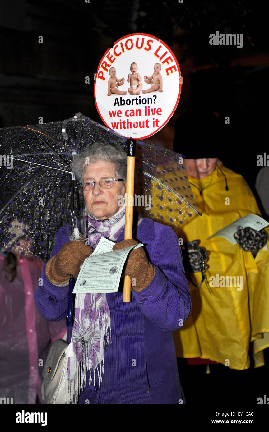Woman attending a Pro- Life group Precious Life candle light procession in Londonderry (Derry). Stock Photo
