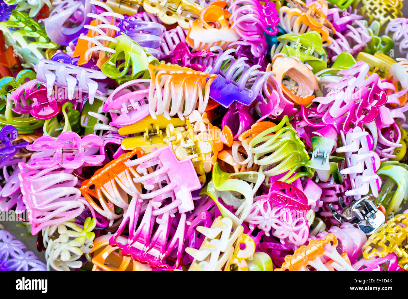 Colorful plastic hair clips as a background Stock Photo