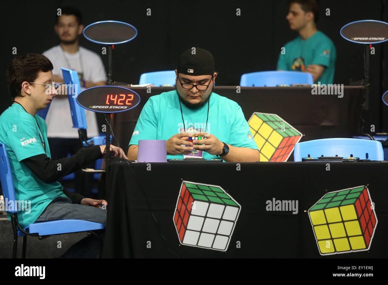 Sao Paulo. 19th July, 2015. Competitors try to solve Rubik's cubes during the 8th Rubik's Cube World Championship in Sao Paulo, Brazil on July 19, 2015. According to local press, around 400 competitors from 40 countries took part in the 2015 event. © Rahel Patrasso/Xinhua/Alamy Live News Stock Photo
