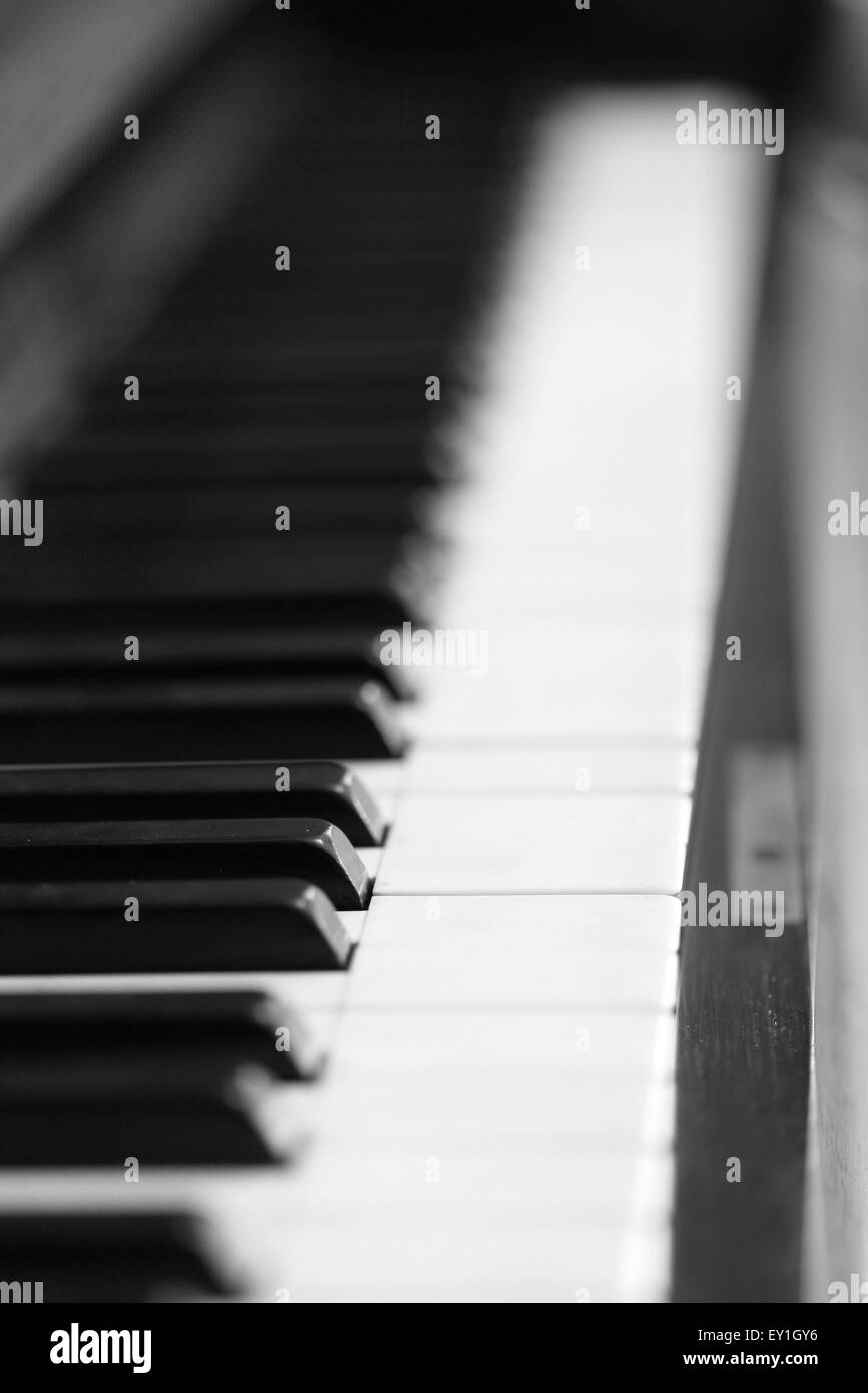 black and white piano keys and wood grain (soft focus Stock Photo Alamy