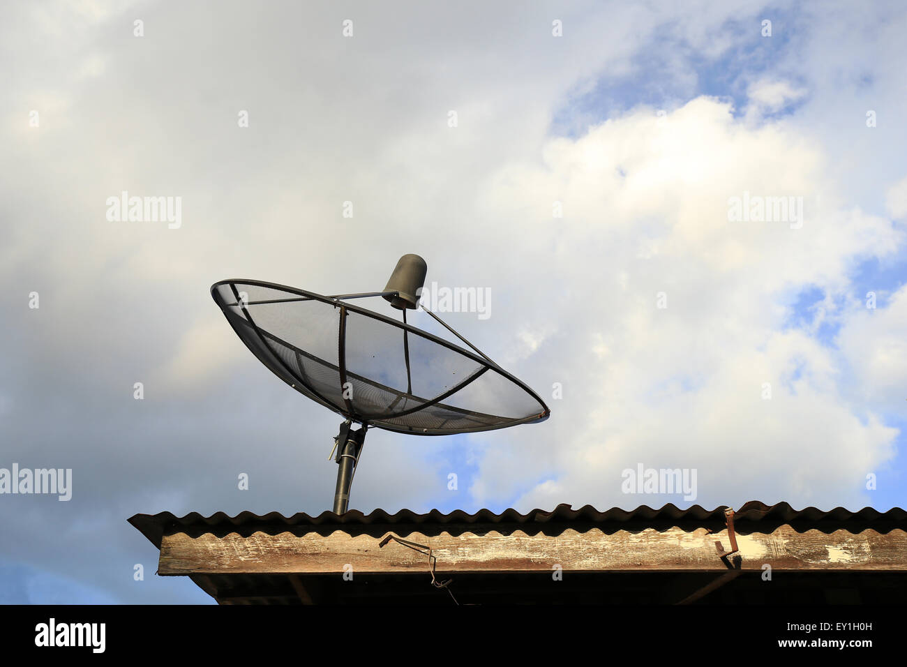 Satellite dish with blue sky and cloud background Stock Photo