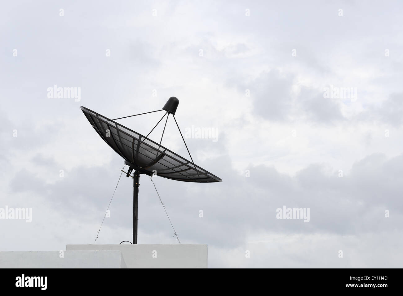 Satellite dish with sky background (cloudy day) Stock Photo