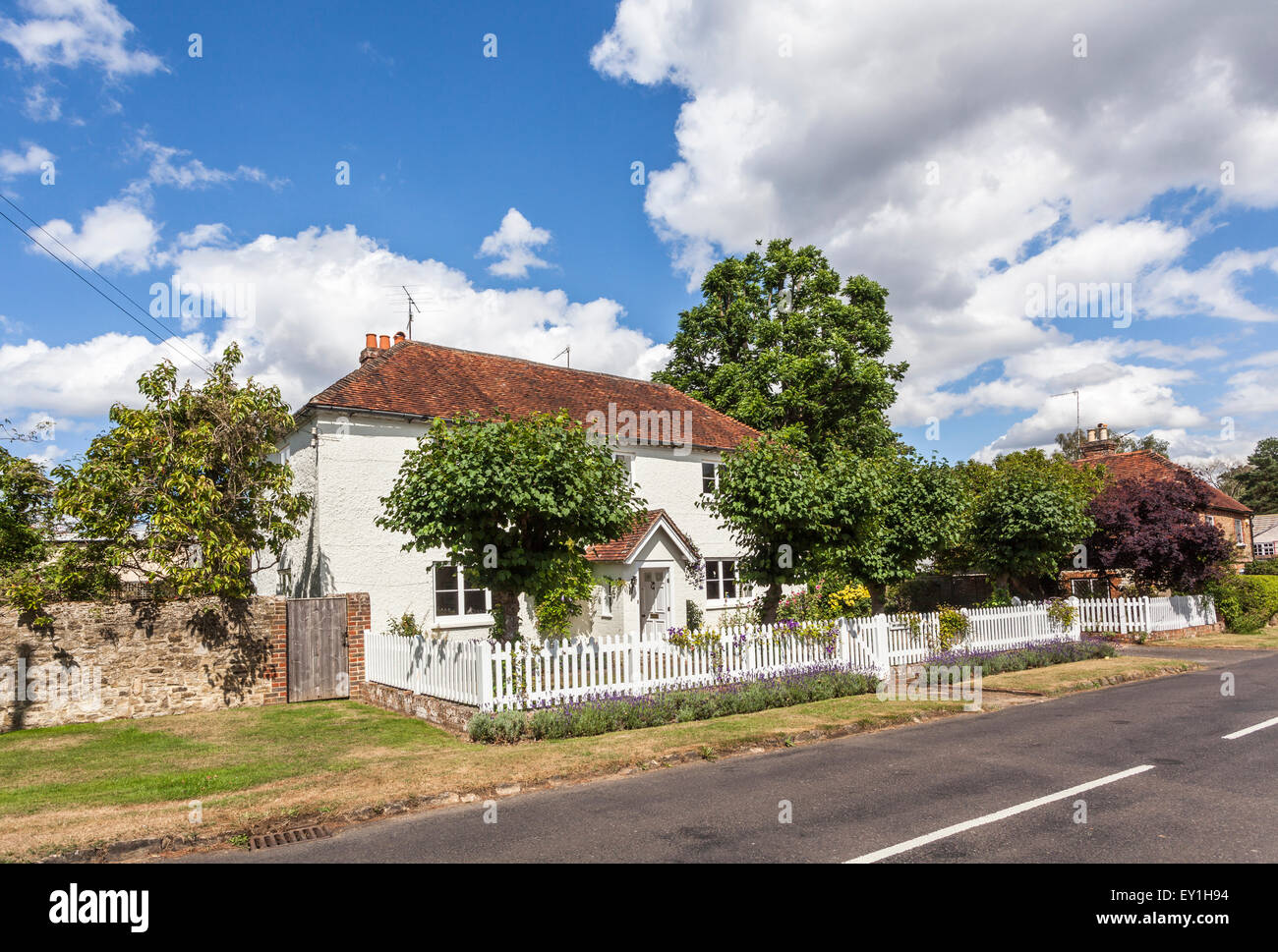 White picket fence english house hires stock photography and images Alamy