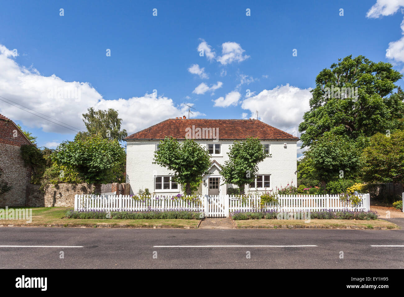 White picket fence english house hires stock photography and images Alamy