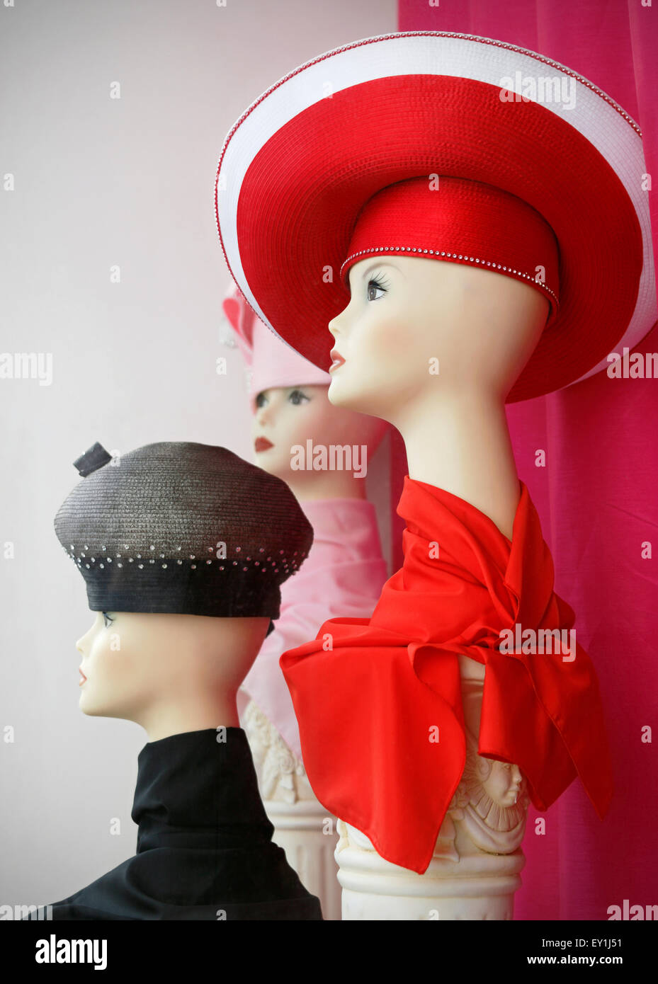 Vintage hats on mannequins on display in store window Stock Photo Alamy