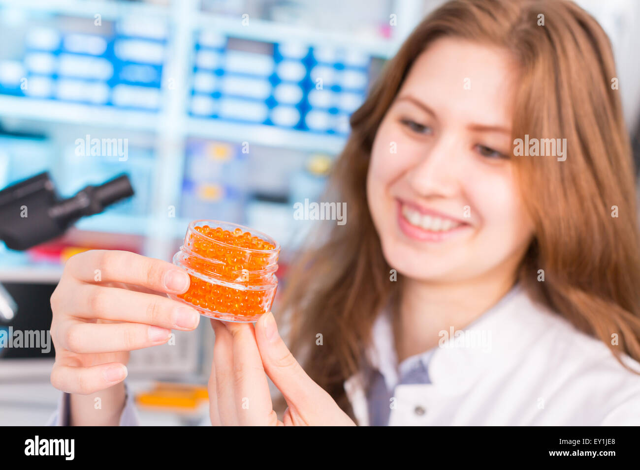 Technician In the laboratory testing food quality artificial fish