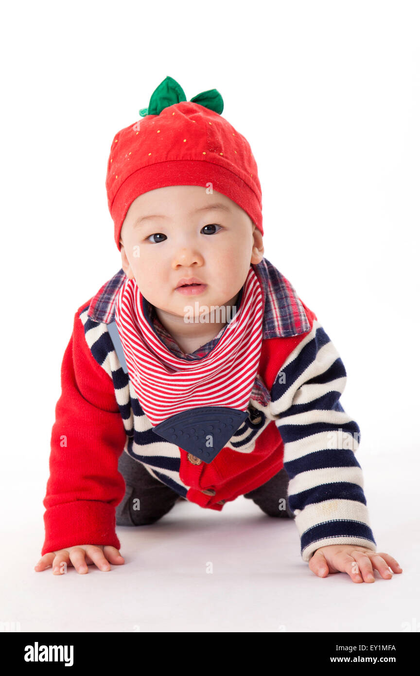 Baby boy looking at the camera Stock Photo - Alamy