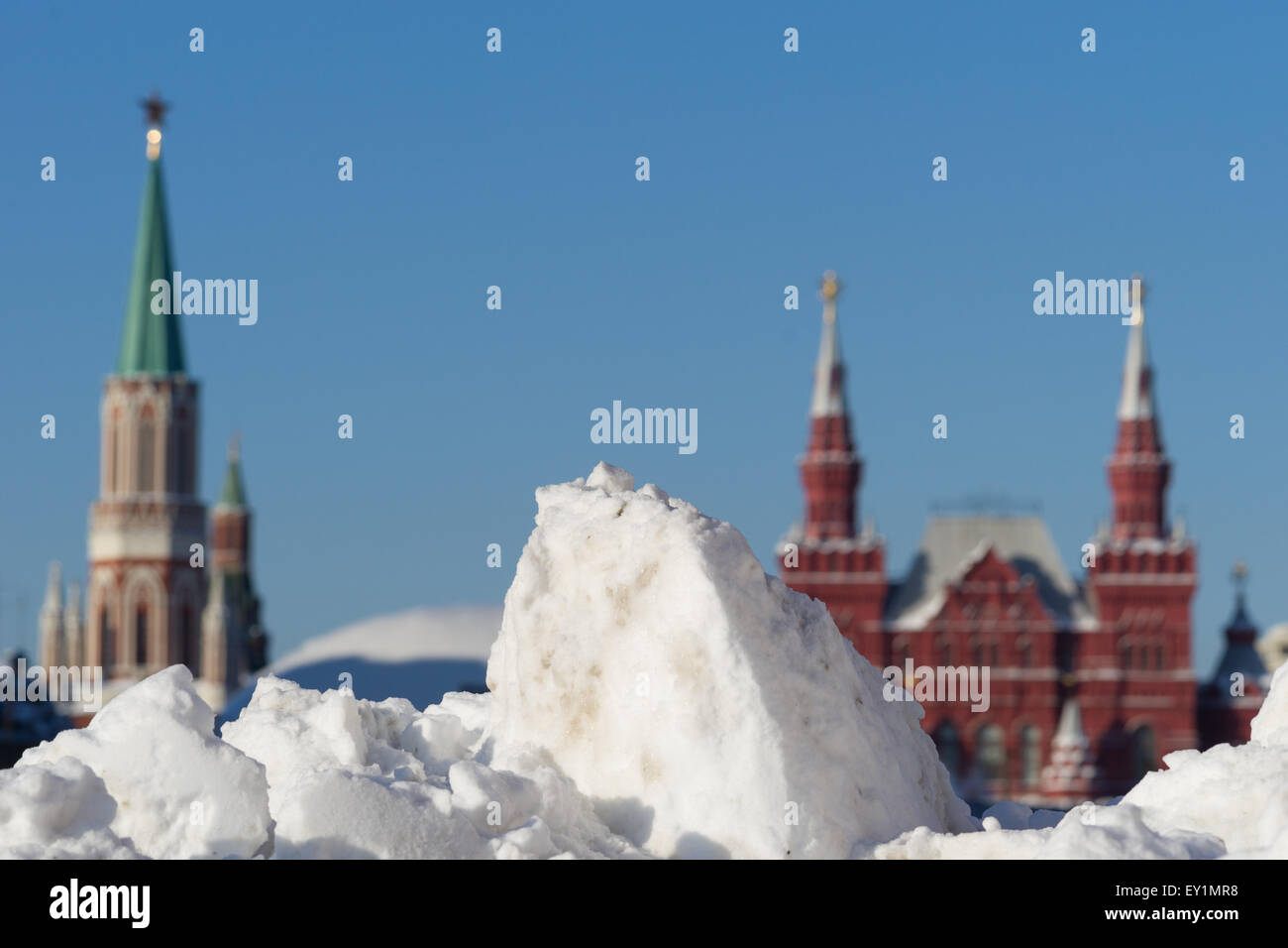 Snow on Red Square of Moscow, Nikolskaya tower of the Kremlin and State historical museum in winter Stock Photo