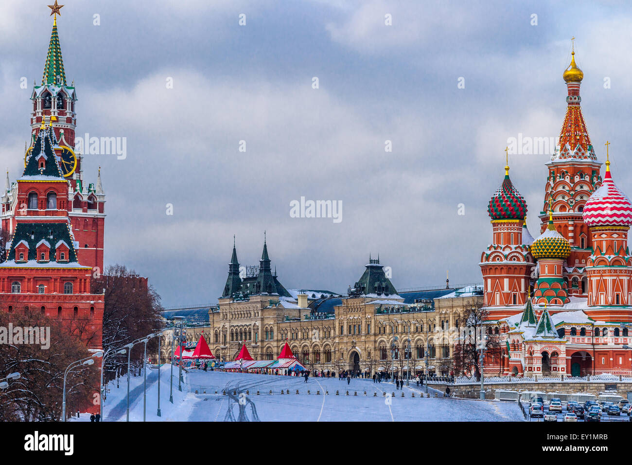 Moscow Red Square in winter. The Kremlin towers (left) skating rink on Red Square (center), St. Basil's cathedral (right) Stock Photo