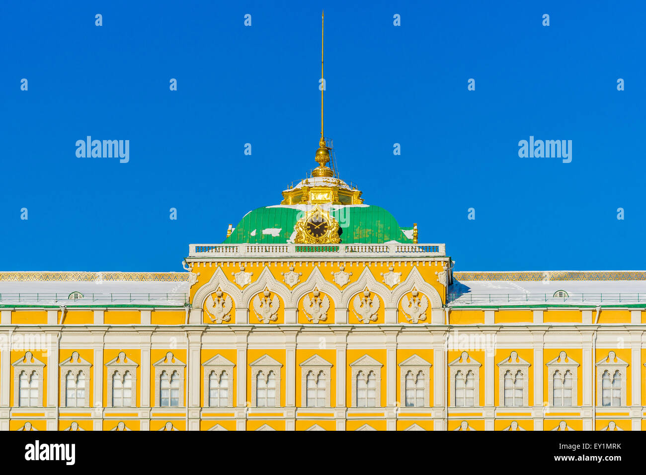Grand Kremlin palace details in the winter day against the background of clear blue sky. Stock Photo