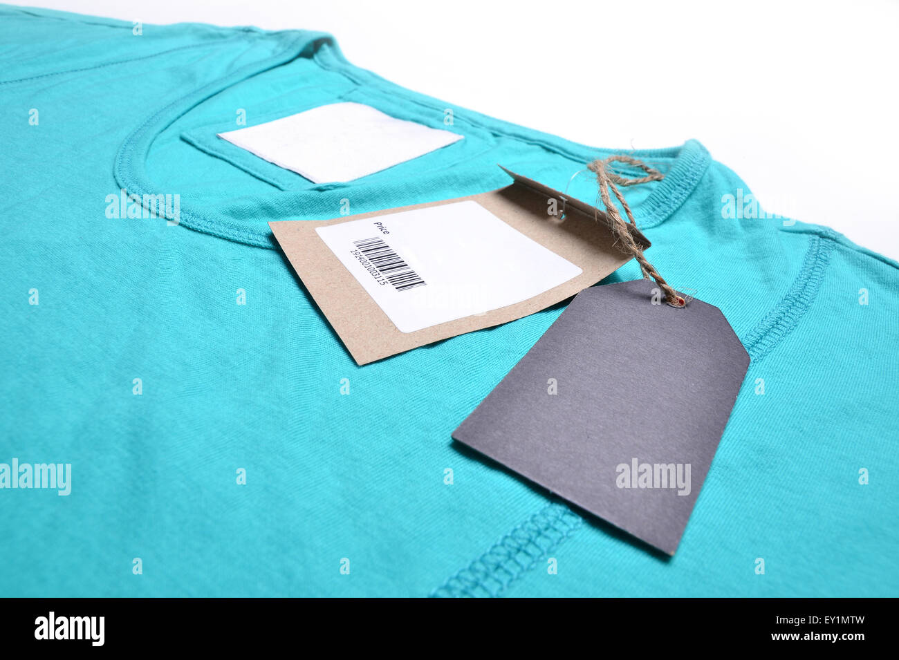 shirt with price tag on white background Stock Photo