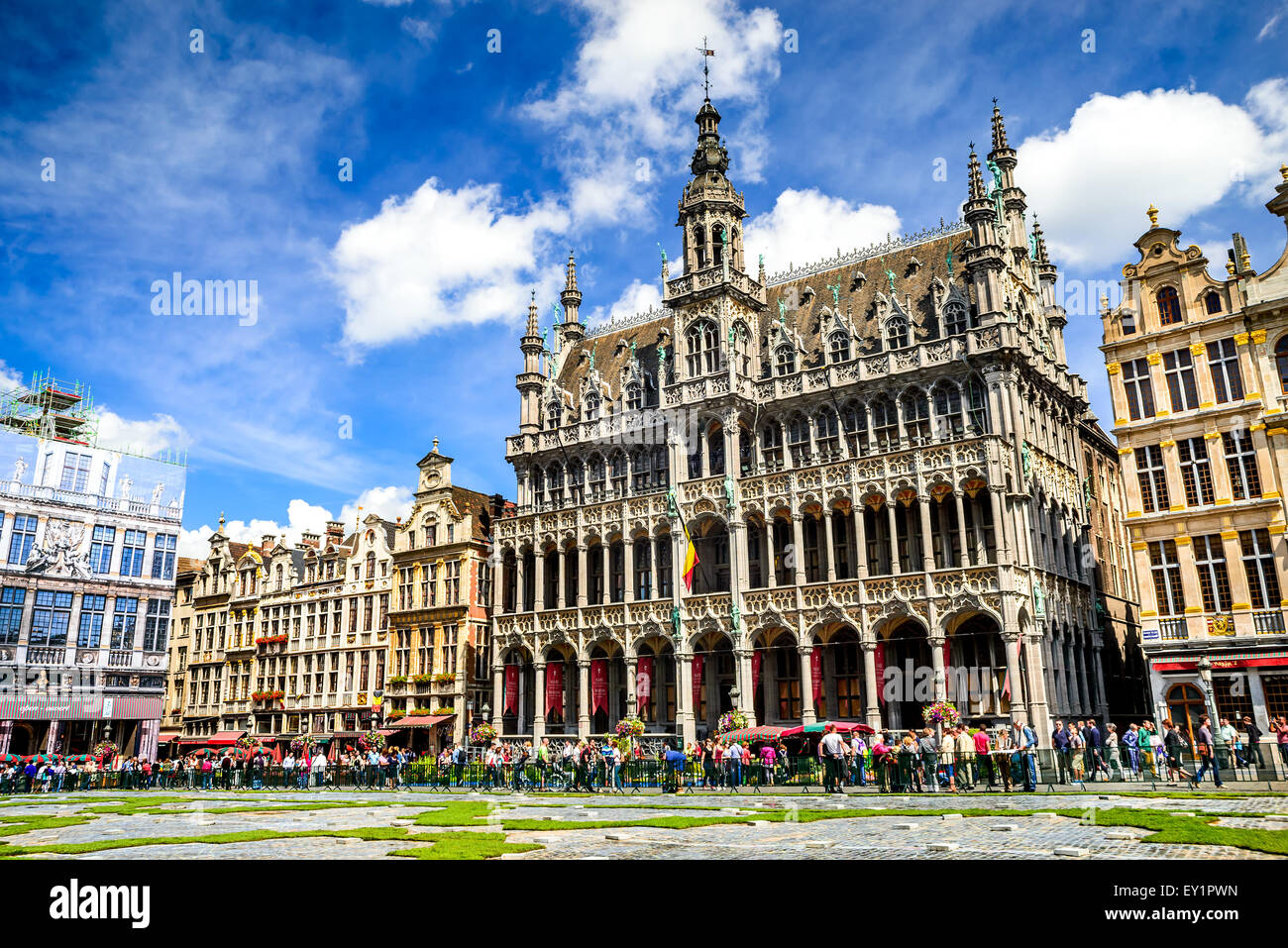 Tourists in Grand Place, Maison du Roi, one of Europe finest historic squares and a “must-see” sight of Brussels, Bruxelles. Stock Photo