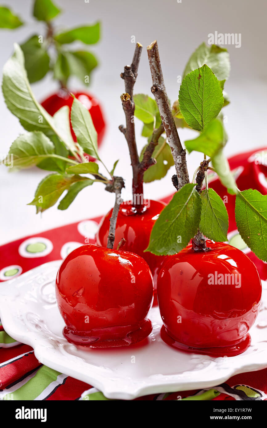 Candied apples on a bunch stick Stock Photo
