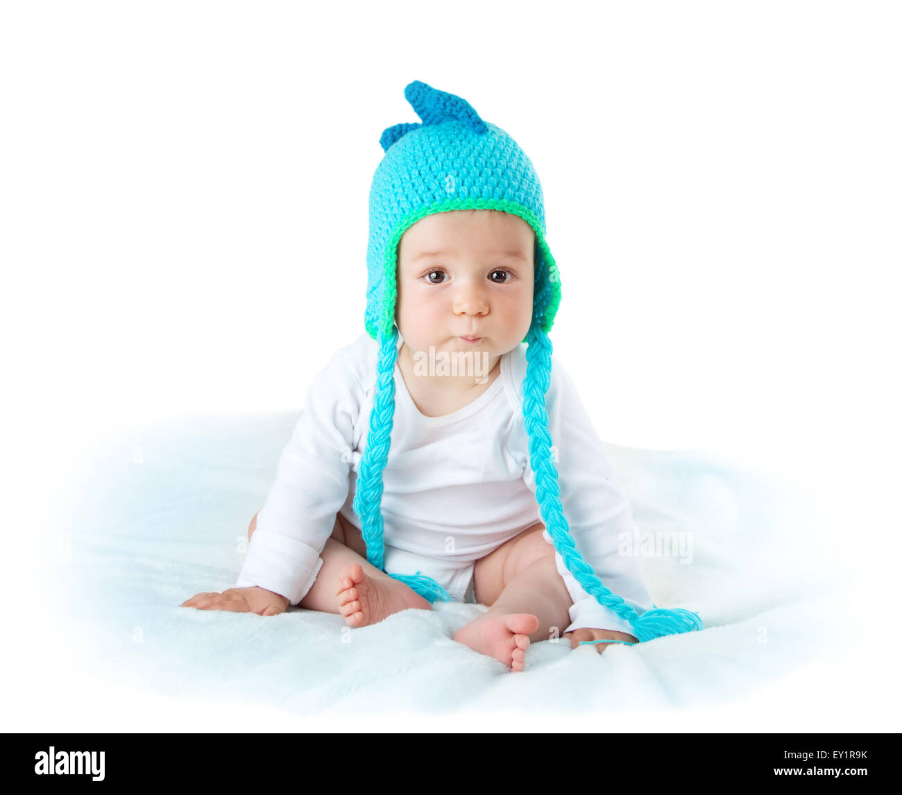 Baby in dinosaur hat Stock Photo - Alamy