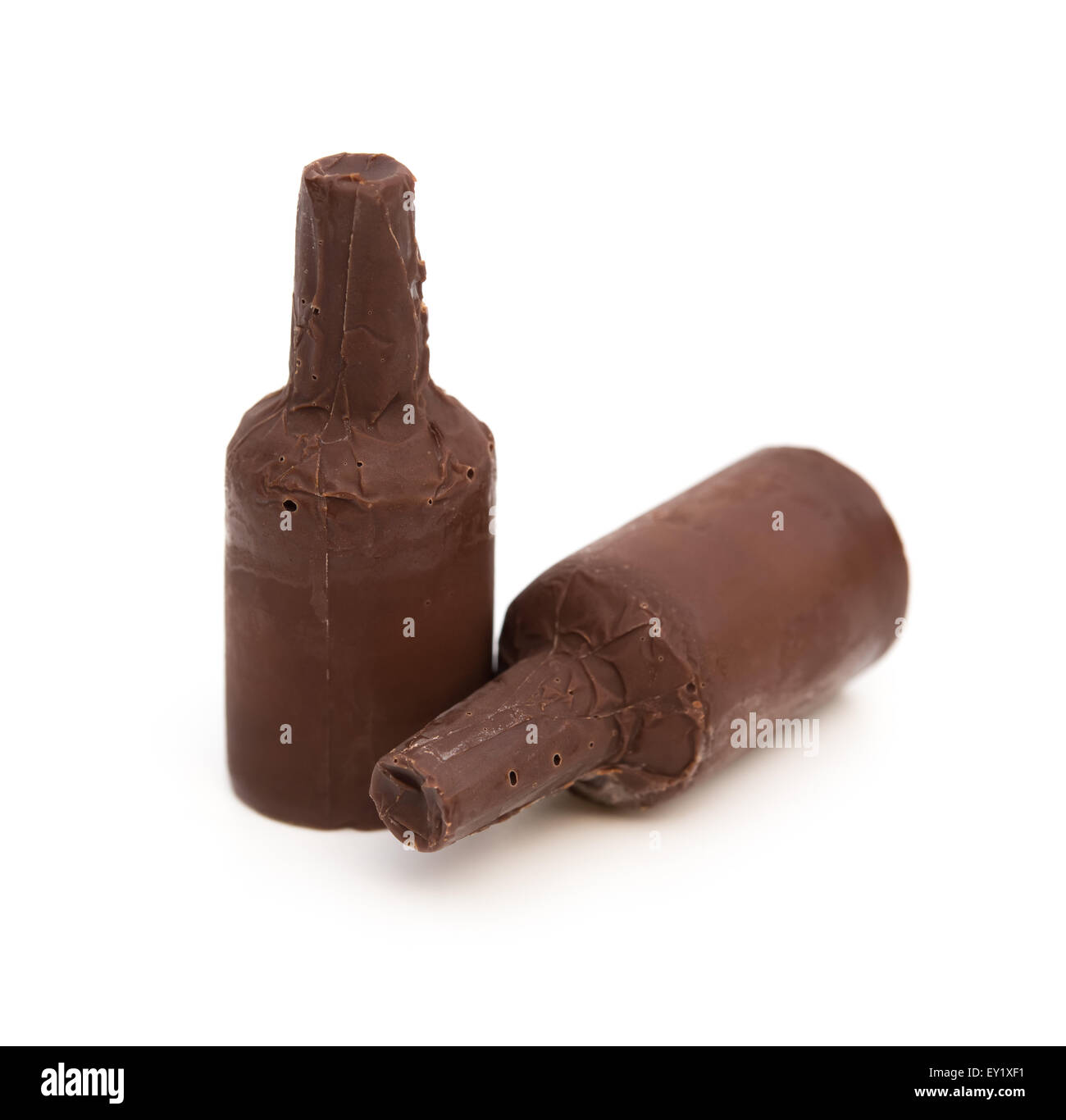 two pieces alcoholfilled chocolate on a white background Stock Photo