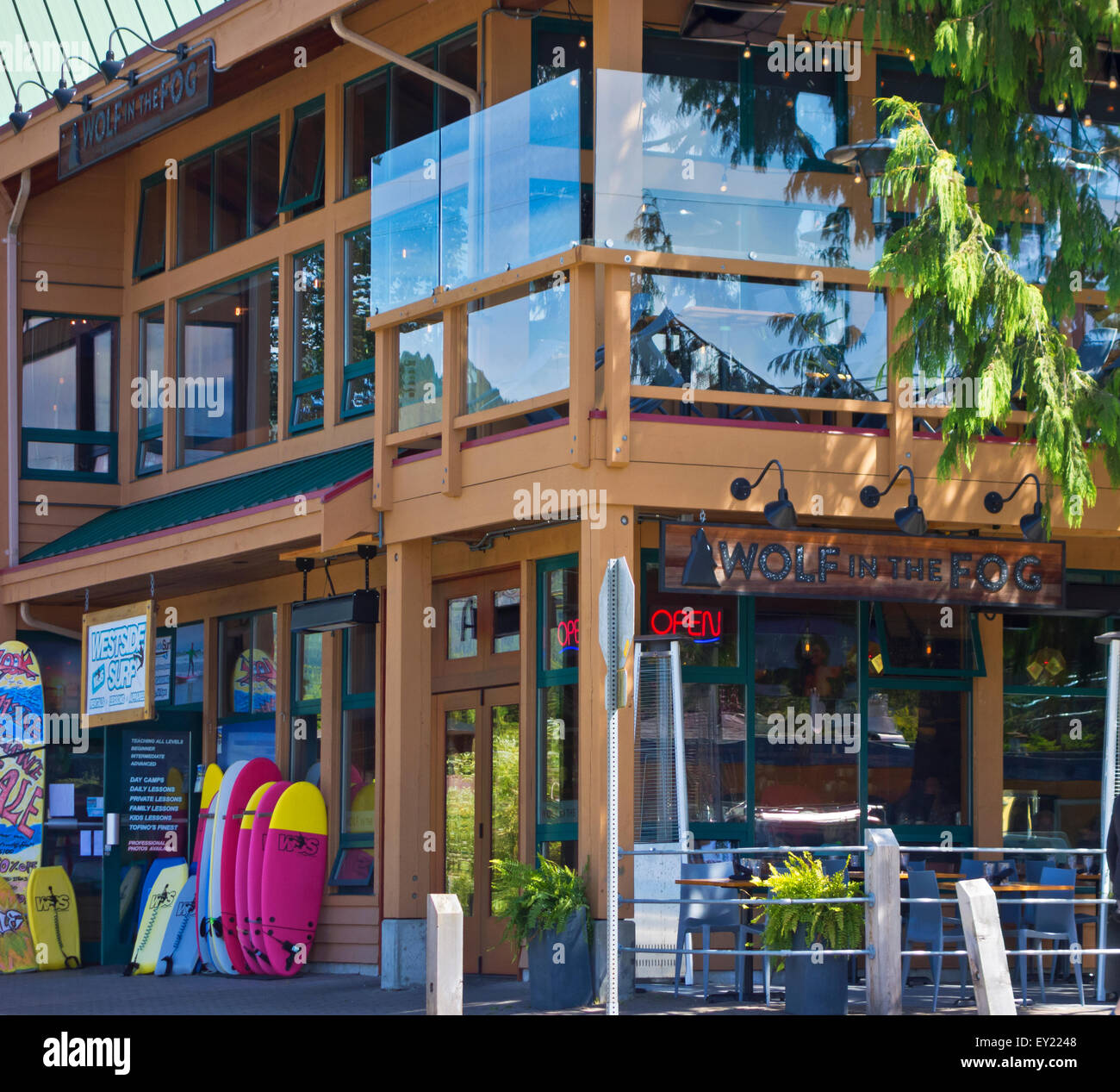 Exterior building of Wolf in the Fog restaurant and a surfer shop in the town of Tofino, British Columbia, on Vancouver Island. Stock Photo