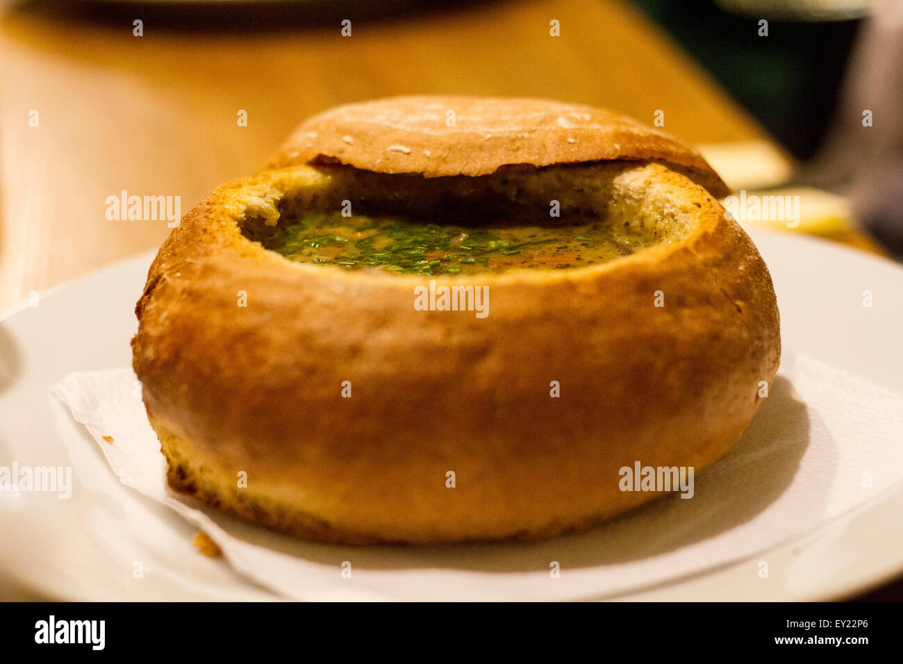 Soup served in a bread bowl, typical Czech plate Stock Photo