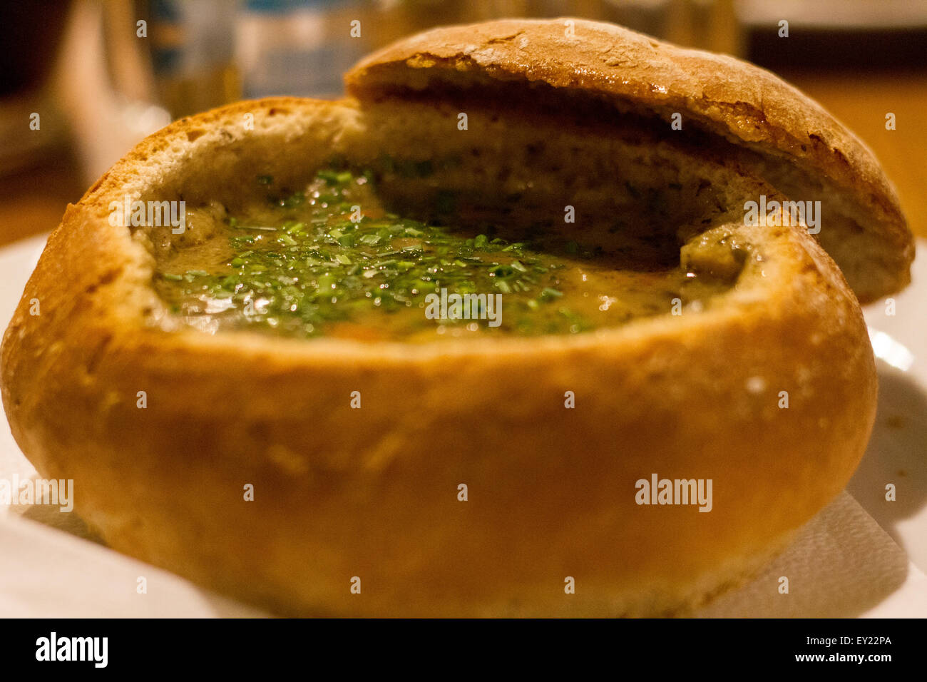 Soup served in a bread bowl, typical Czech plate Stock Photo