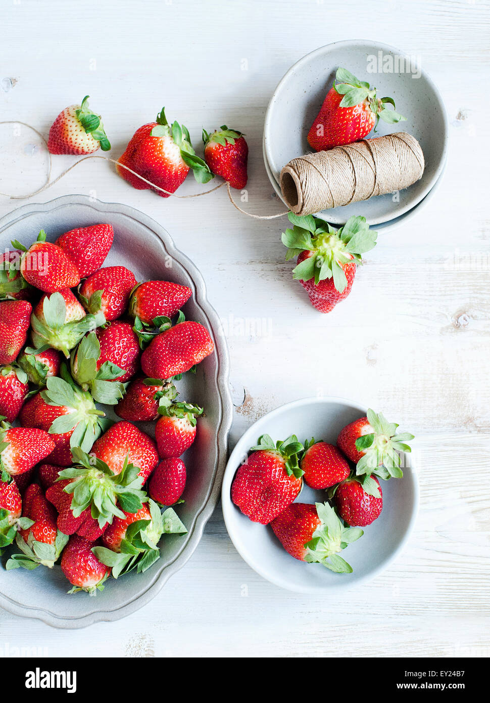 Still life of fresh organic strawberries in bowls Stock Photo - Alamy