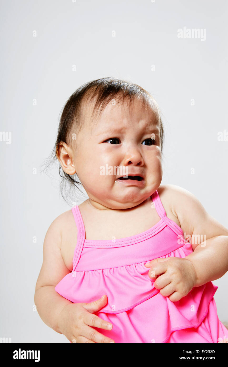 Portrait of baby girl, crying Stock Photo