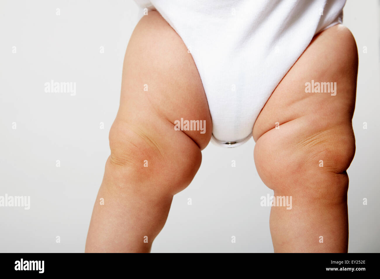Baby's legs, mid section Stock Photo