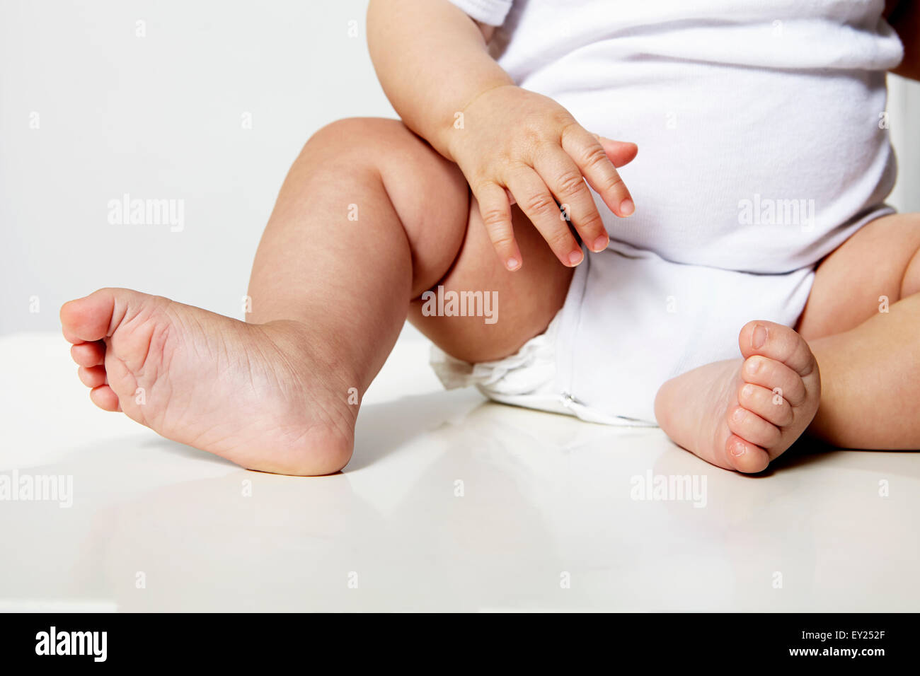 Baby's legs, low section Stock Photo