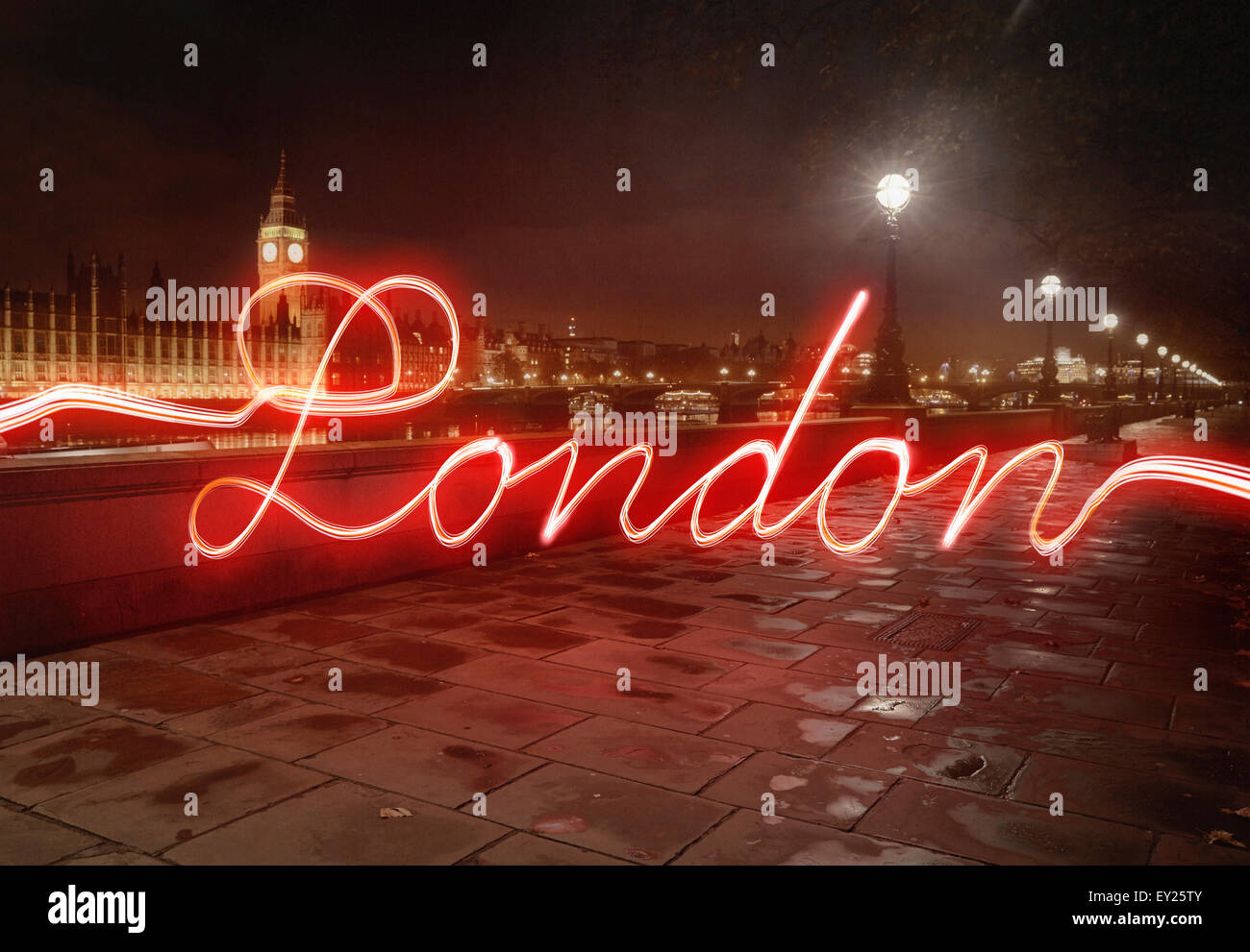 Light trail of the word London written across London scene Stock Photo
