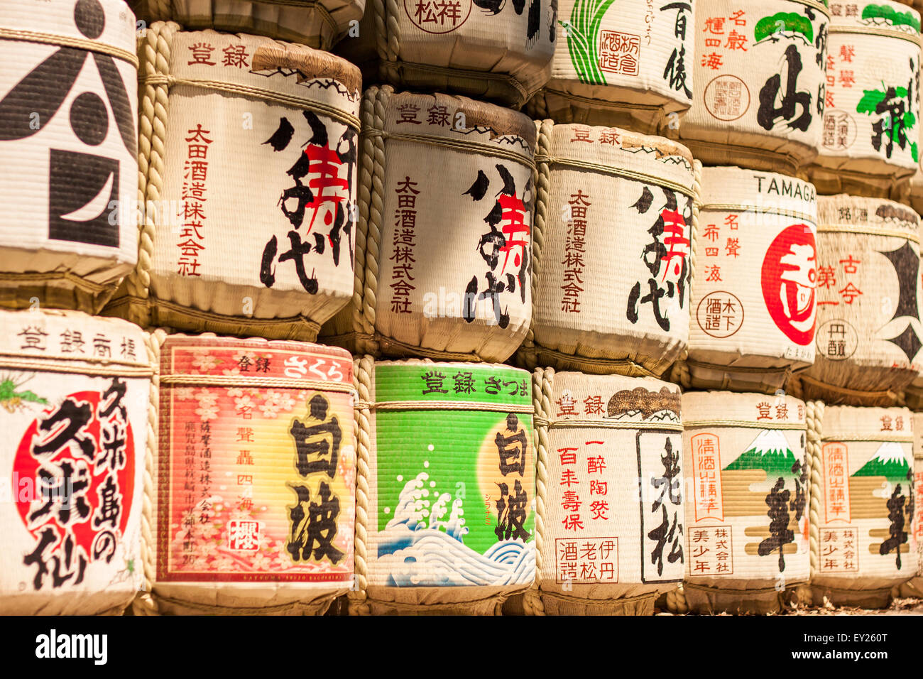 Barrels of sake wrapped in straw hires stock photography and images