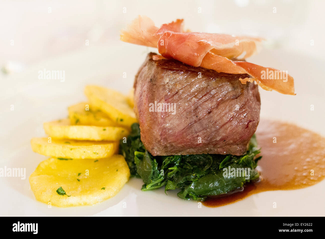 Meat with potatoes and spinach Stock Photo