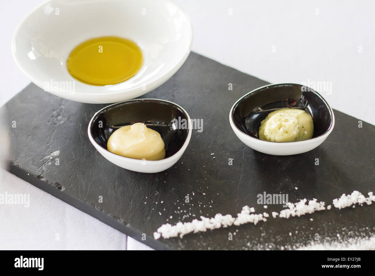 Butter and oil plate Stock Photo
