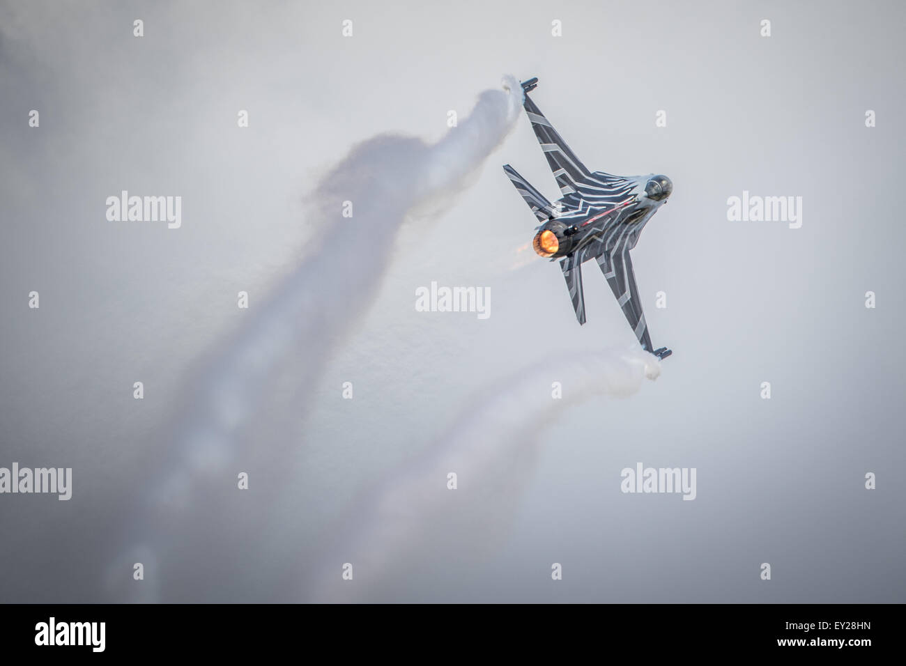 Belgium F-16 fighter jet display aircraft, blue sky. Stock Photo