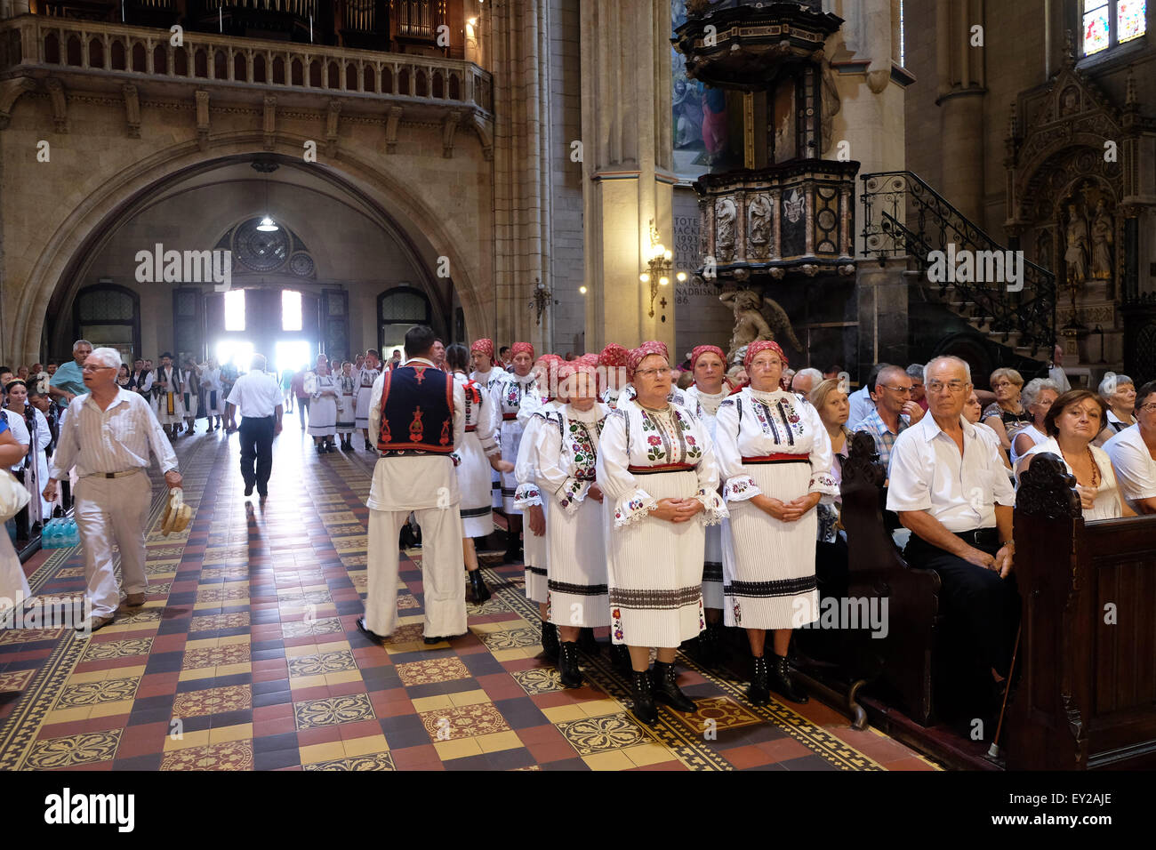 Participants in the 49th International Folklore Festival at Sunday Mass in the Zagreb cathedral, Croatia Stock Photo