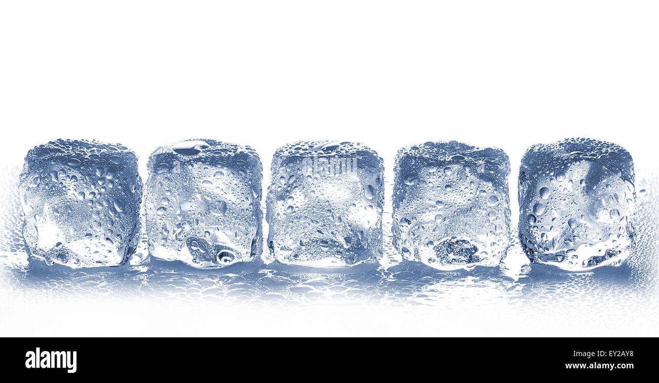 ice cubes with water drops close-up isolated on a white background ...