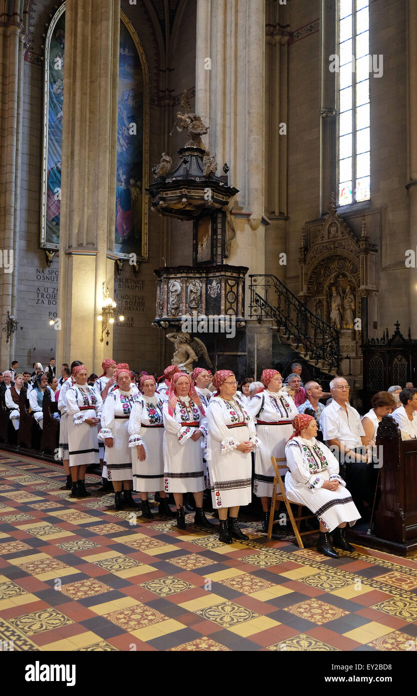 Participants in the 49th International Folklore Festival at Sunday Mass in the Zagreb cathedral, Croatia Stock Photo