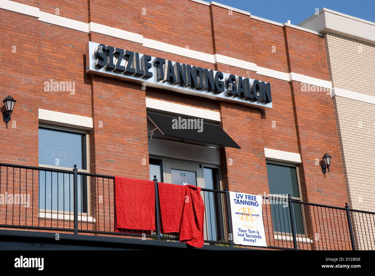 A tanning salon advertising UV Free Tanning Stock Photo Alamy