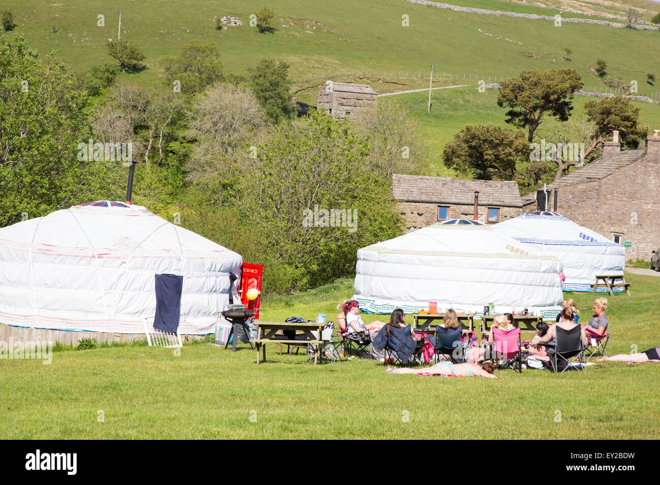 A group of ladies enjoying the outdoors on a Yurt campsite, Yorkshire Dales National Park, North Yorkshire, England, UK Stock Photo