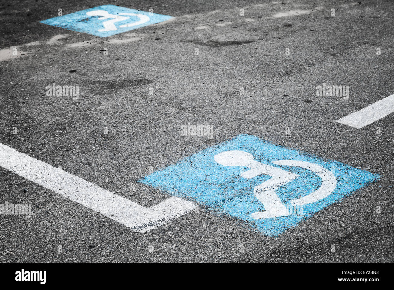 Road marking of place for disabled persons on urban parking lot Stock Photo
