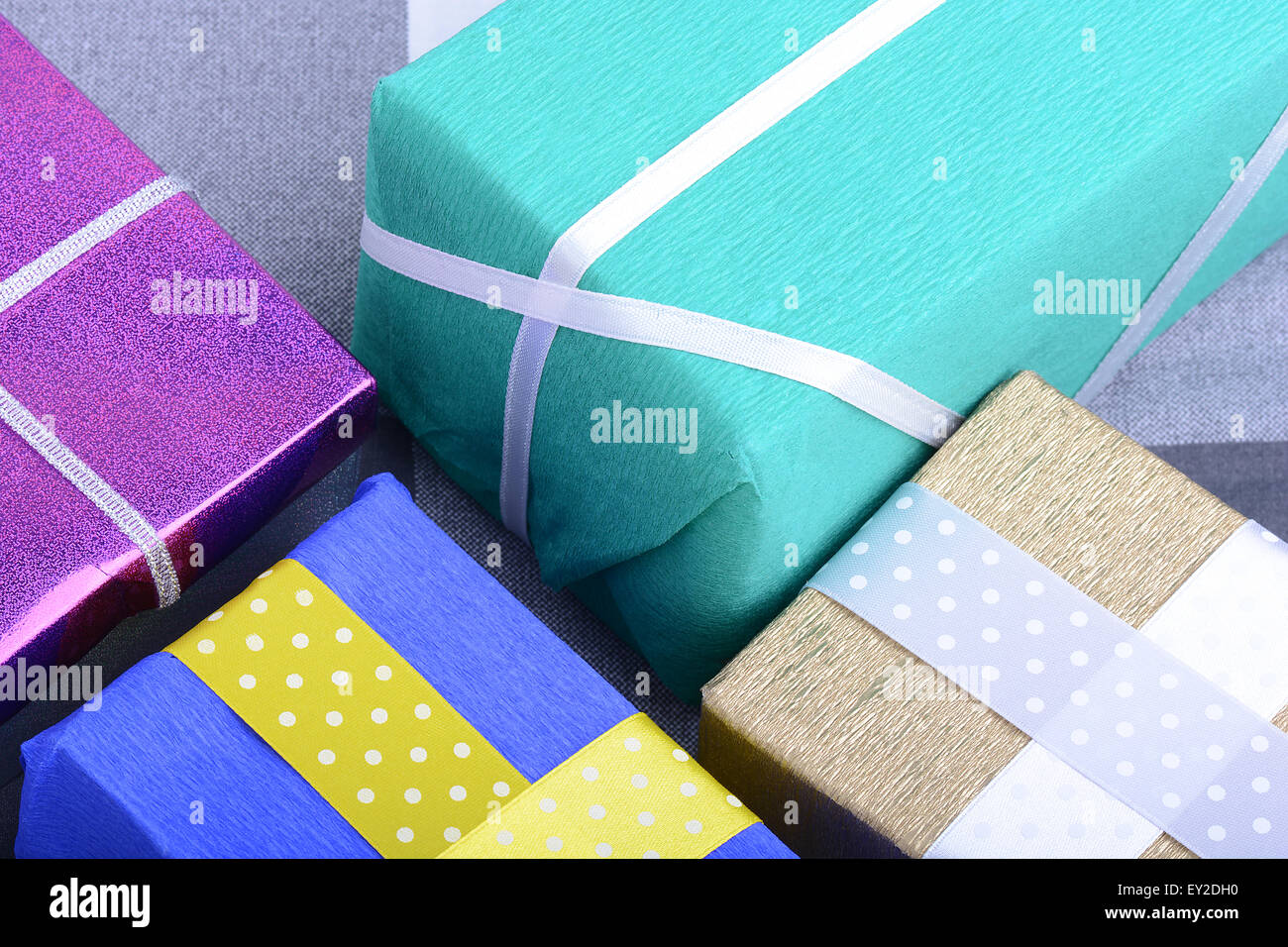 bright gifts with ribbons, holiday invitation card Stock Photo - Alamy
