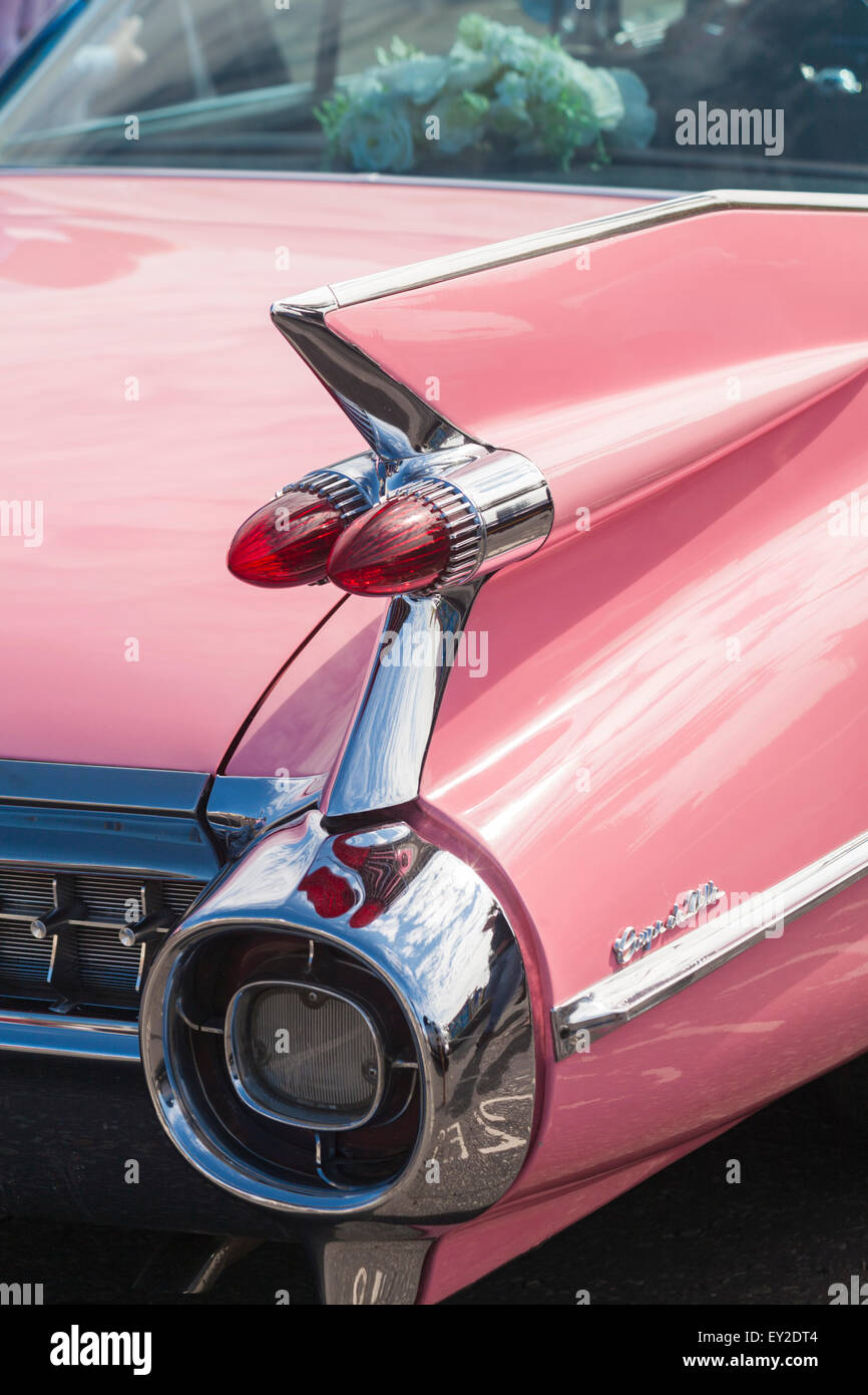 rear detail of Pink Cadillac on display at vintage event at Poole Quay, Dorset, UK in July Stock Photo