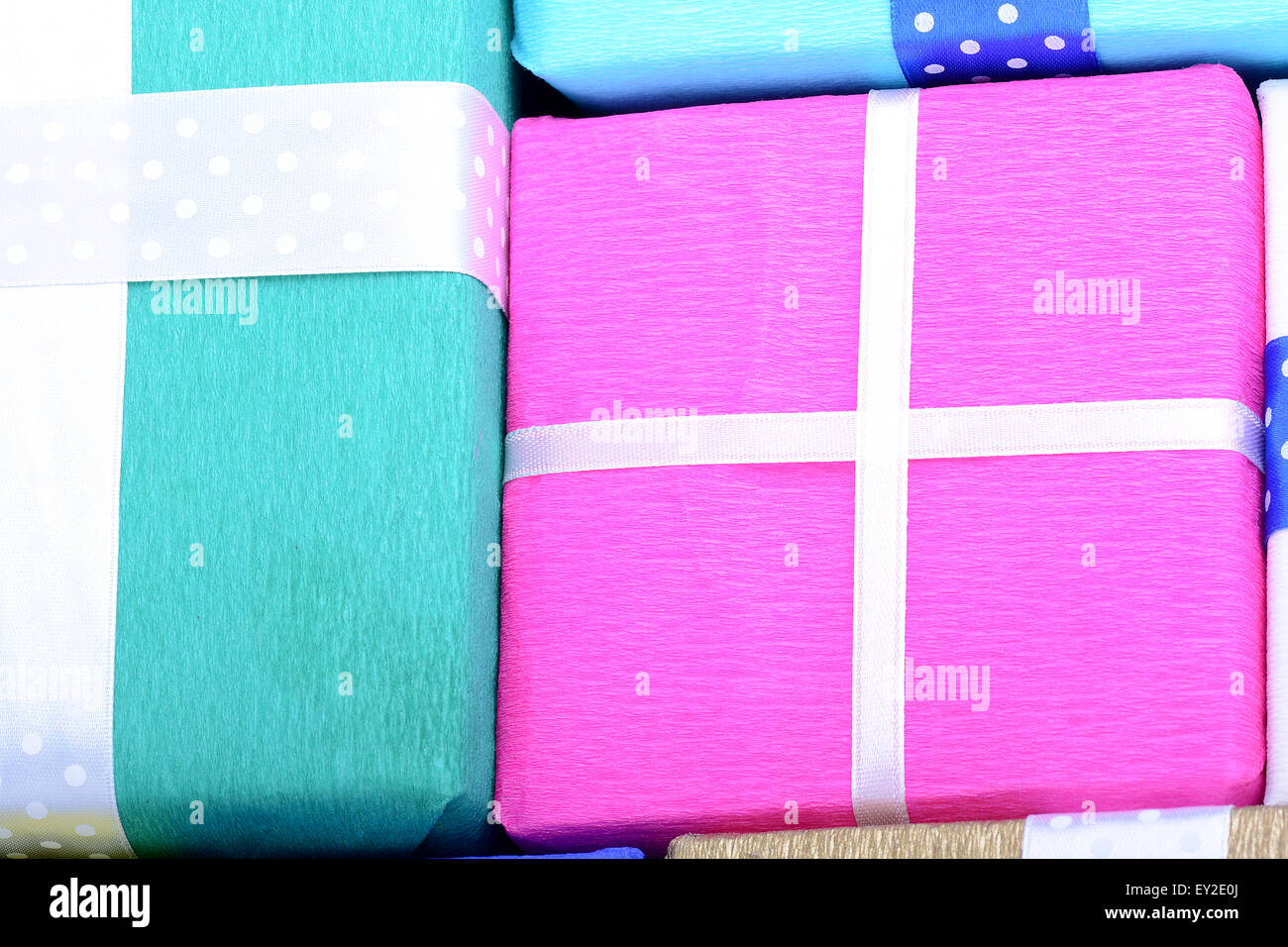 bright gifts with ribbons, holiday invitation card Stock Photo - Alamy