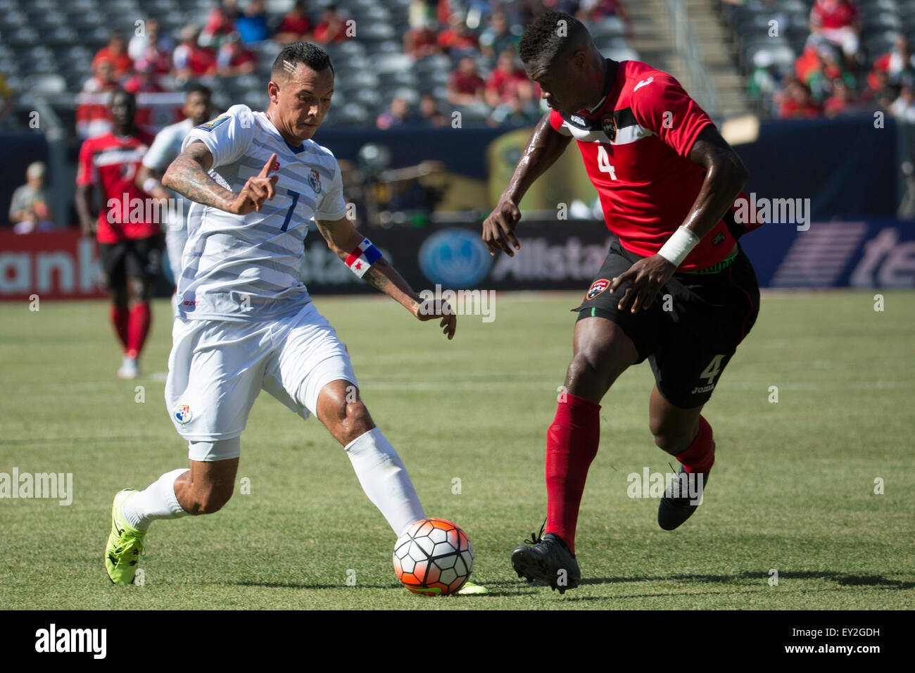 The Match By Shootout. 19th July, 2015. Panama forward Blas Perez (7) in action against Trinidad & Tobago defense Sheldon Bateau (4) during the CONCACAF Gold Cup 2015 Quarterfinal match between the Trinidad & Tobago and Panama at MetLife Stadium in East Rutherford, New Jersey. Panama won the match by shootout. (Christopher Szagola/Cal Sport Media) © csm/Alamy Live News Stock Photo