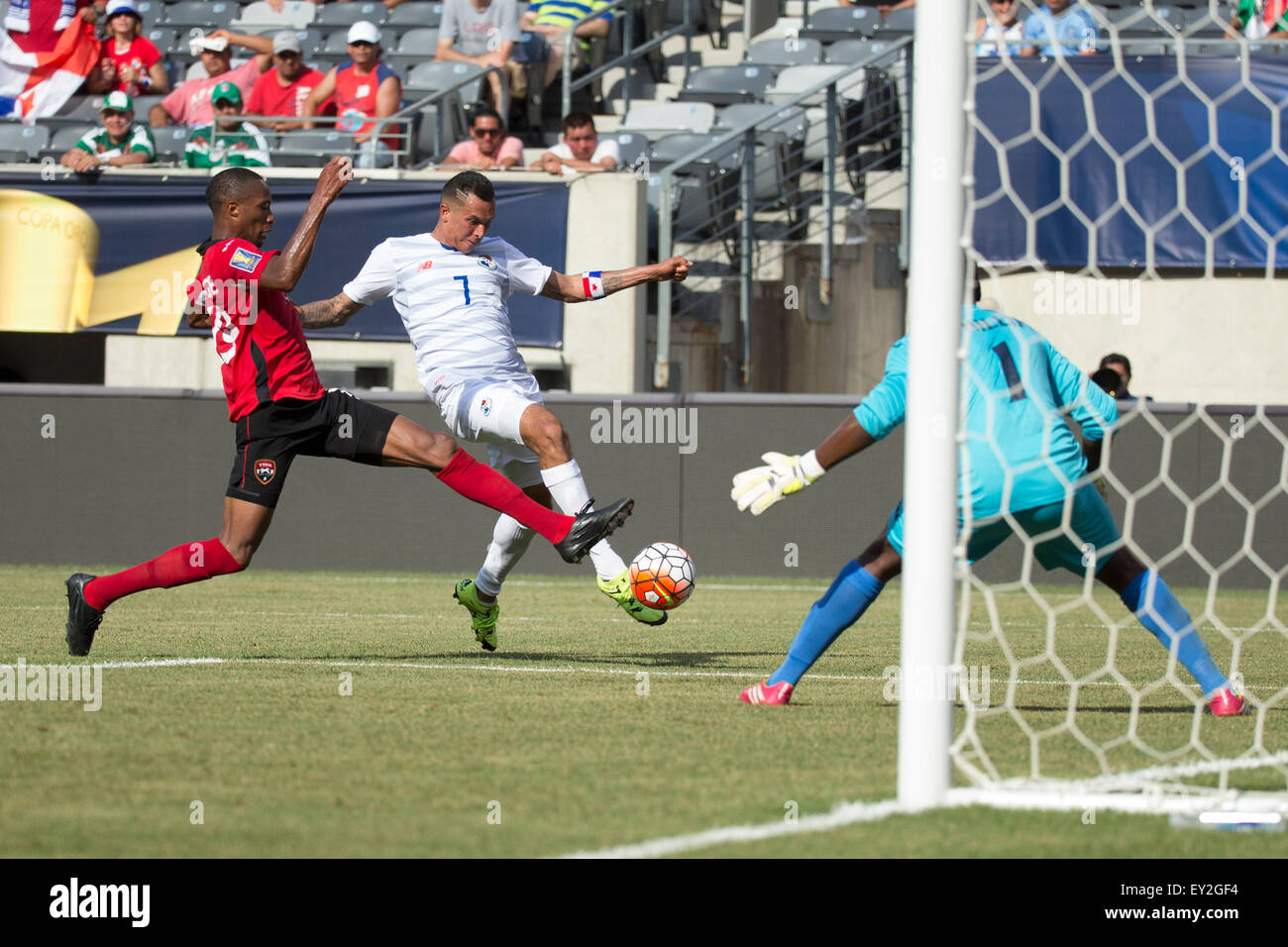 The Match By Shootout. 19th July, 2015. Panama forward Blas Perez (7) tries to shoot the ball on Trinidad & Tobago goalkeeper Marvin Phillip (1) as midfielder Kevan George (19) defending during the CONCACAF Gold Cup 2015 Quarterfinal match between the Trinidad & Tobago and Panama at MetLife Stadium in East Rutherford, New Jersey. Panama won the match by shootout. (Christopher Szagola/Cal Sport Media) © csm/Alamy Live News Stock Photo