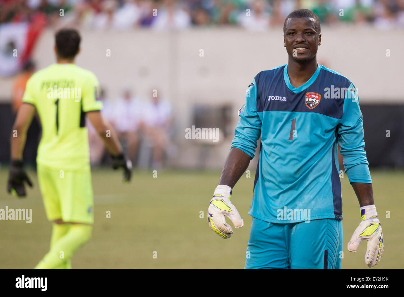 The Match By Shootout. 19th July, 2015. Trinidad & Tobago goalkeeper Marvin Phillip (1) walks to his waiting spot as Panama goalkeeper Jaime Penedo (1) heads to the goal area for the shootout during the CONCACAF Gold Cup 2015 Quarterfinal match between the Trinidad & Tobago and Panama at MetLife Stadium in East Rutherford, New Jersey. Panama won the match by shootout. (Christopher Szagola/Cal Sport Media) © csm/Alamy Live News Stock Photo